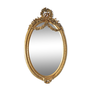 Miroir ovale doré avec