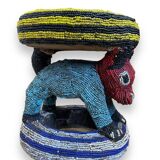 Zoomorphic beaded coffee table stool