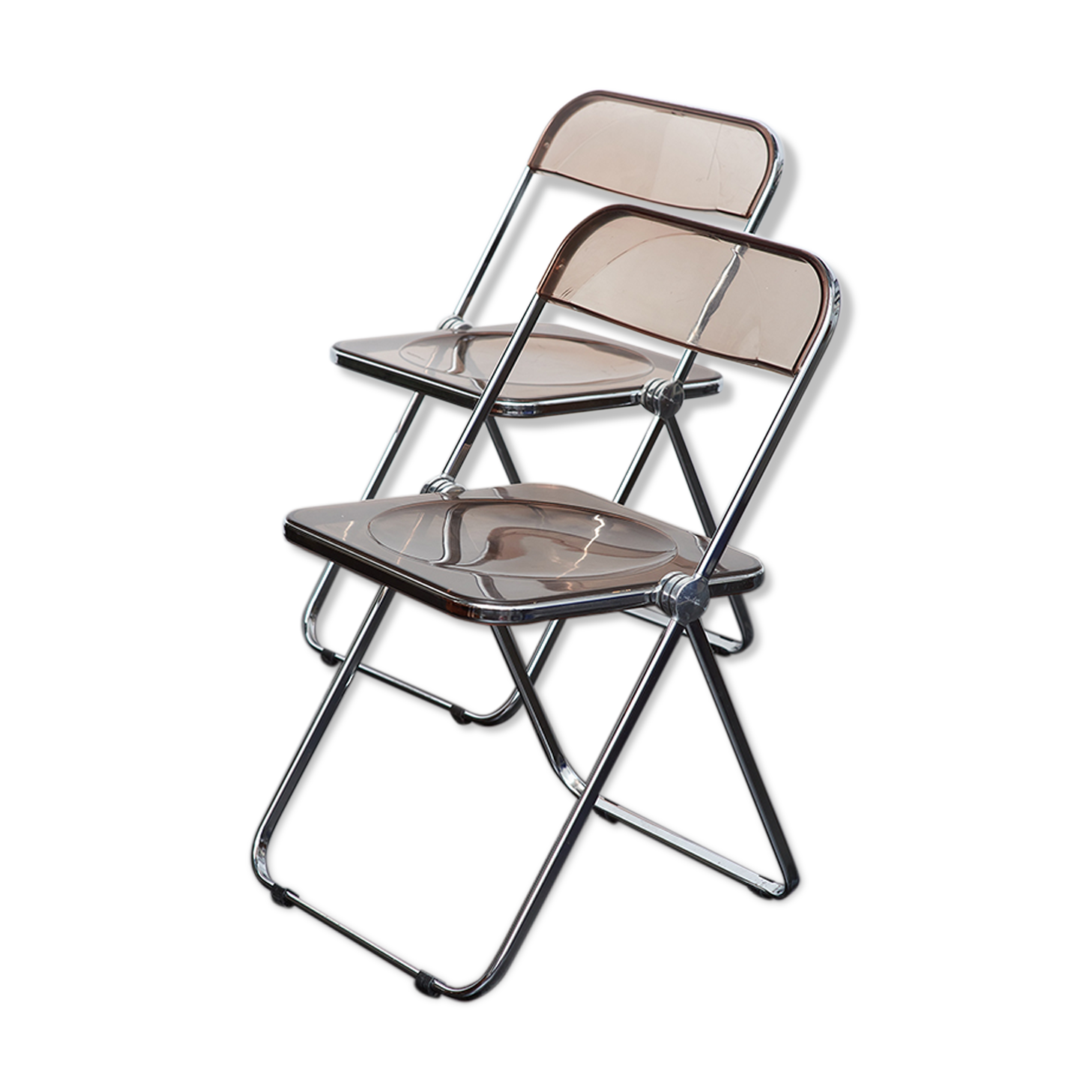 2 Plia caramel chairs by Giancarlo Piretti