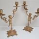 Pair of vintage golden brass cherub candlesticks