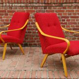 Pair of red armchairs model 6953 by Jaroslav Smidek published by TON