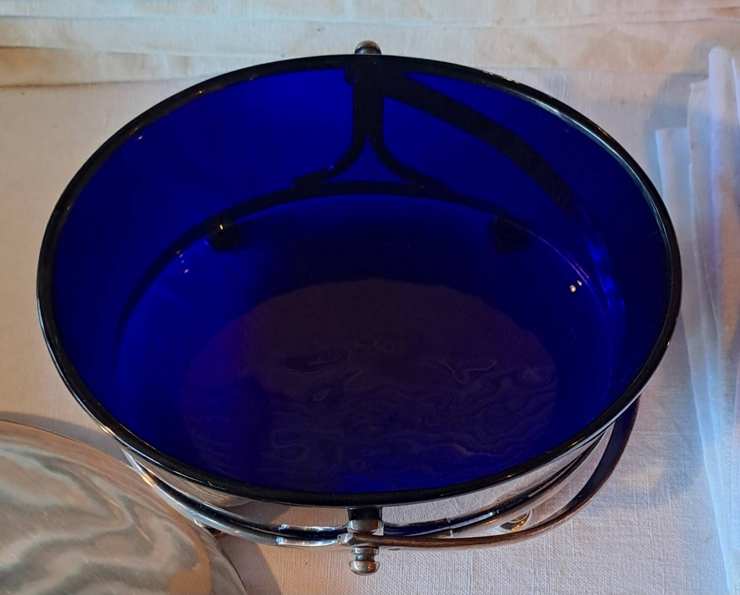 Silver-plated metal and blue glass biscuit jar