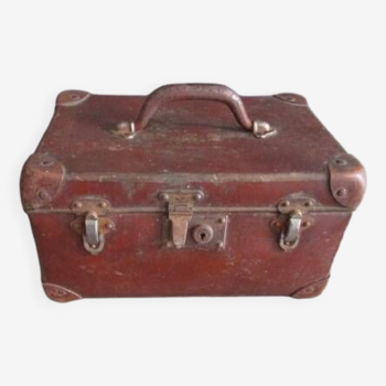 Old cardboard and metal suitcase