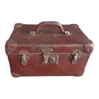 Old cardboard and metal suitcase