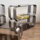 Stainless steel and smoked glass shelves by Donald Singer