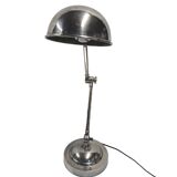 articulated desk lamp in chrome-plated brass