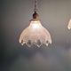 Trio of Art Deco scalloped clear glass pendant lights, 1920-30