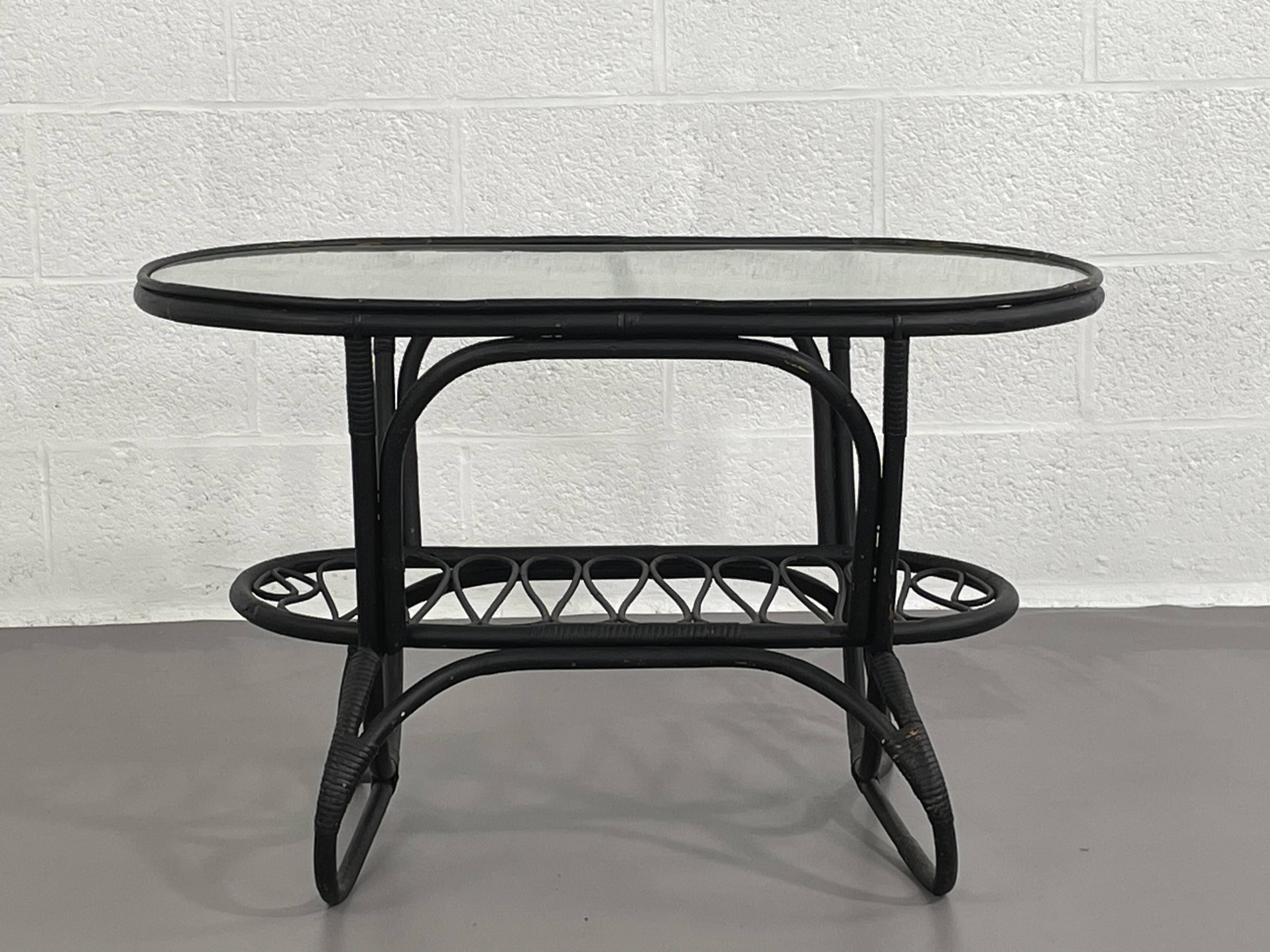 Black rattan and glass coffee table
