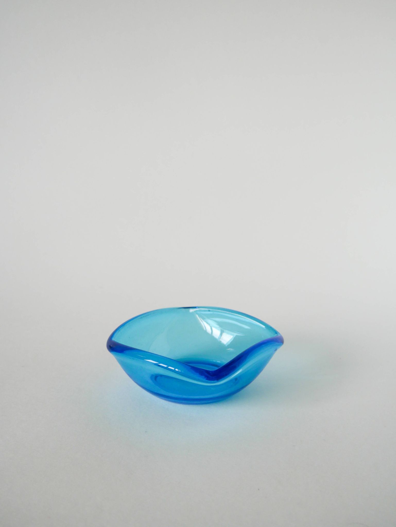 Blue colored glass pocket, in the style of Murano, 1970