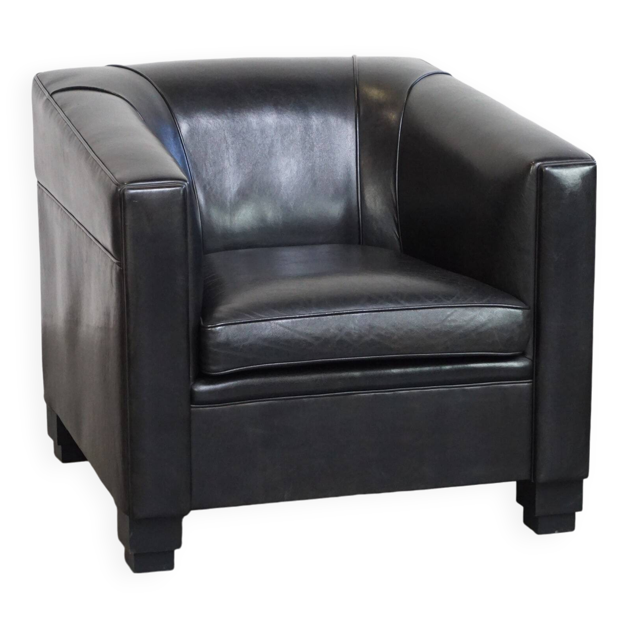 Very comfortable black Art Deco design armchair, made of sheepskin leather