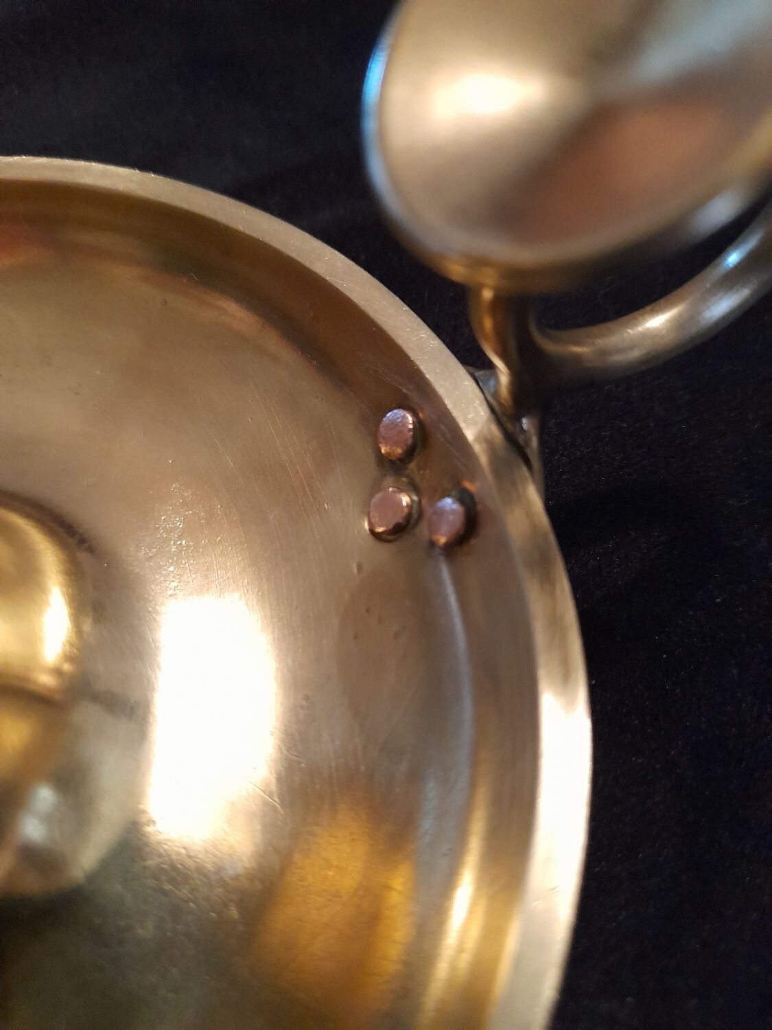 Tailed candle holder.