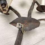 Wall lamp in wrought iron.
