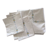 Sheet and pillowcases with small flower embroidered braid