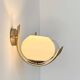 Pair of vintage wall sconces, brass and opaline, France, 1970.