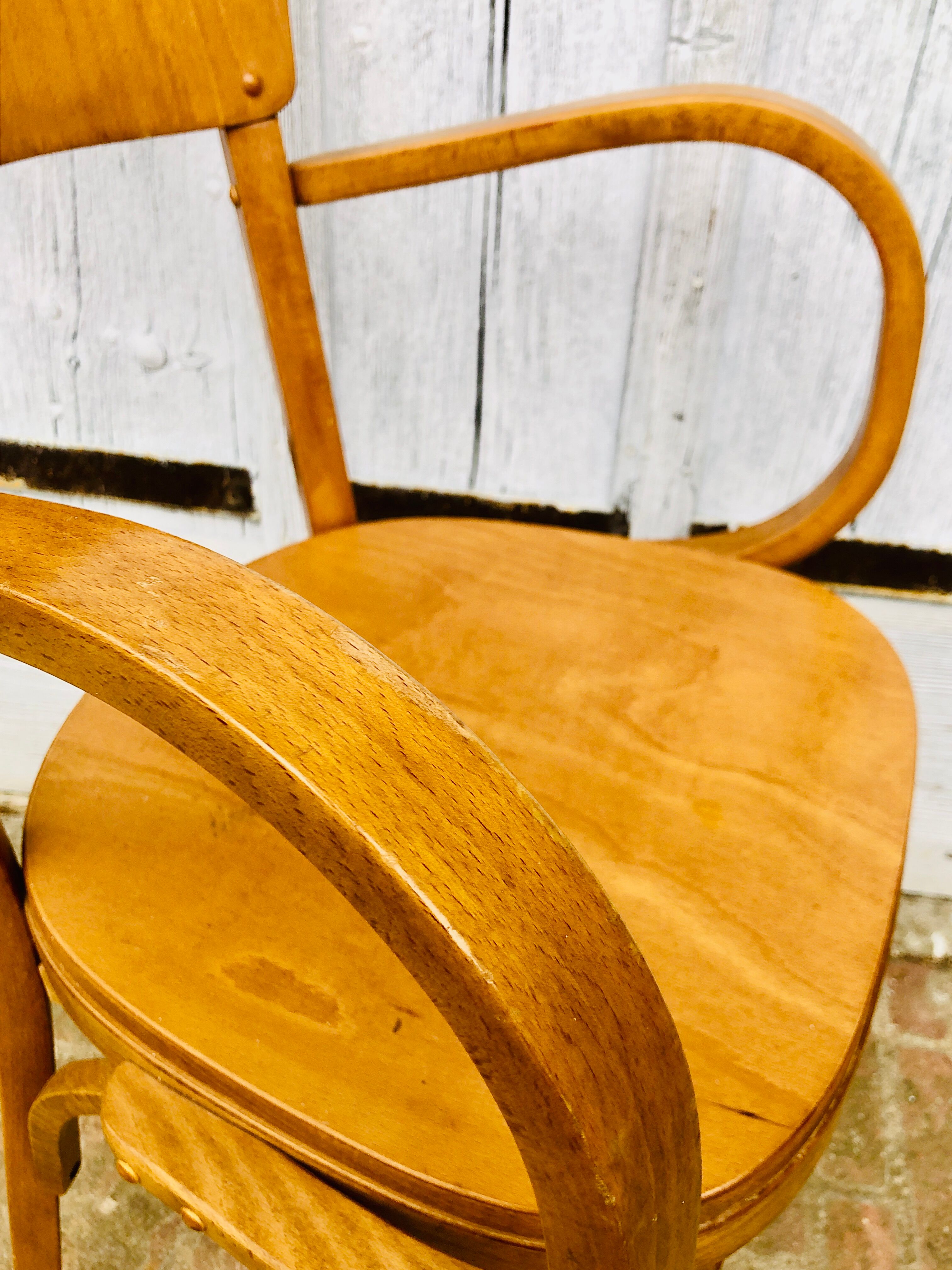 Baumann armchair curved wood armrests