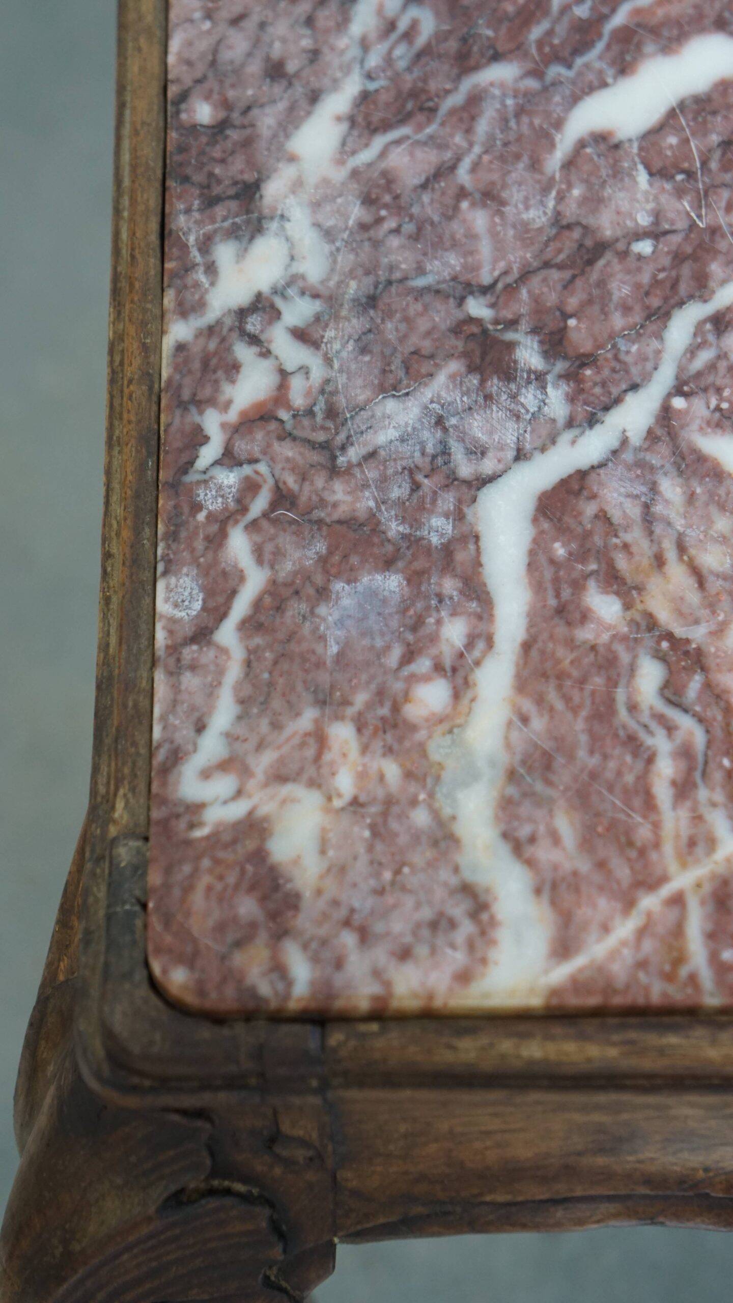 French late 18th century side table with a wooden frame and a marble top