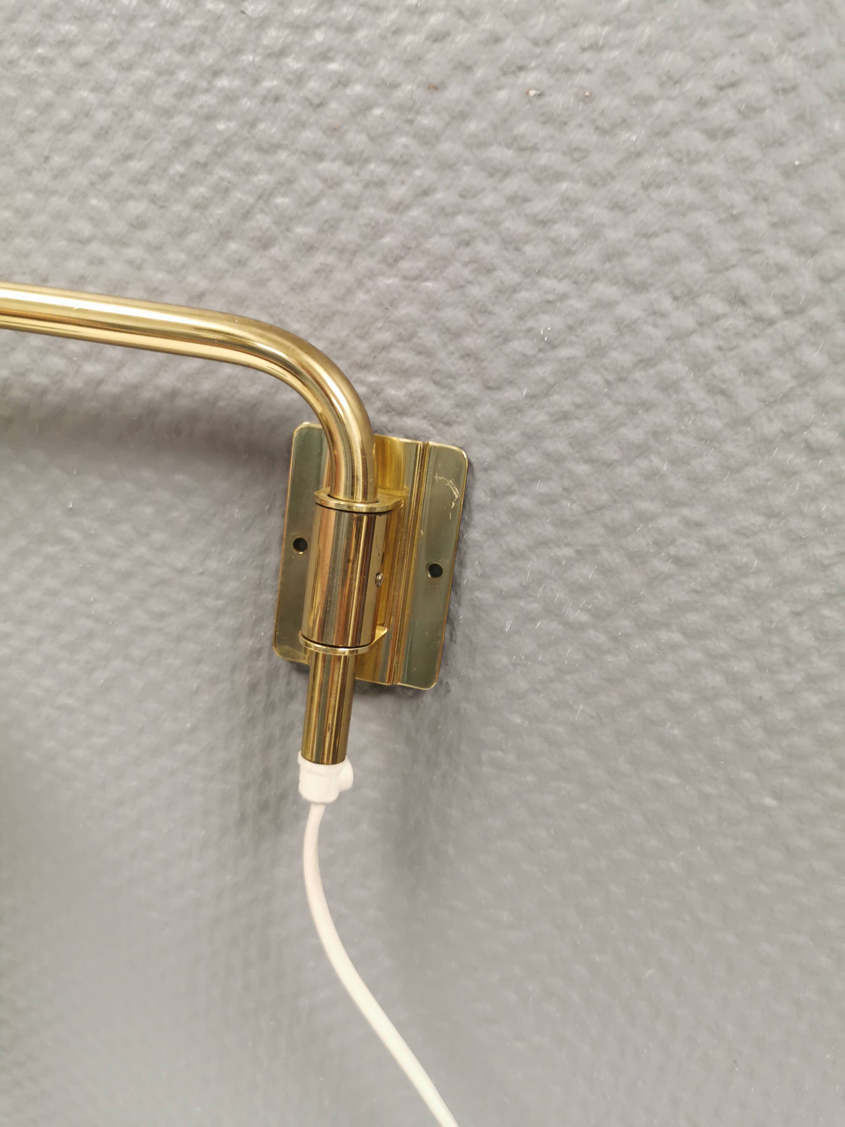 Danish “swing arm” wall lamp in brass by Lyskaer Lightning (LB) 1980s.