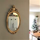 Oval gilded mirror baroque style