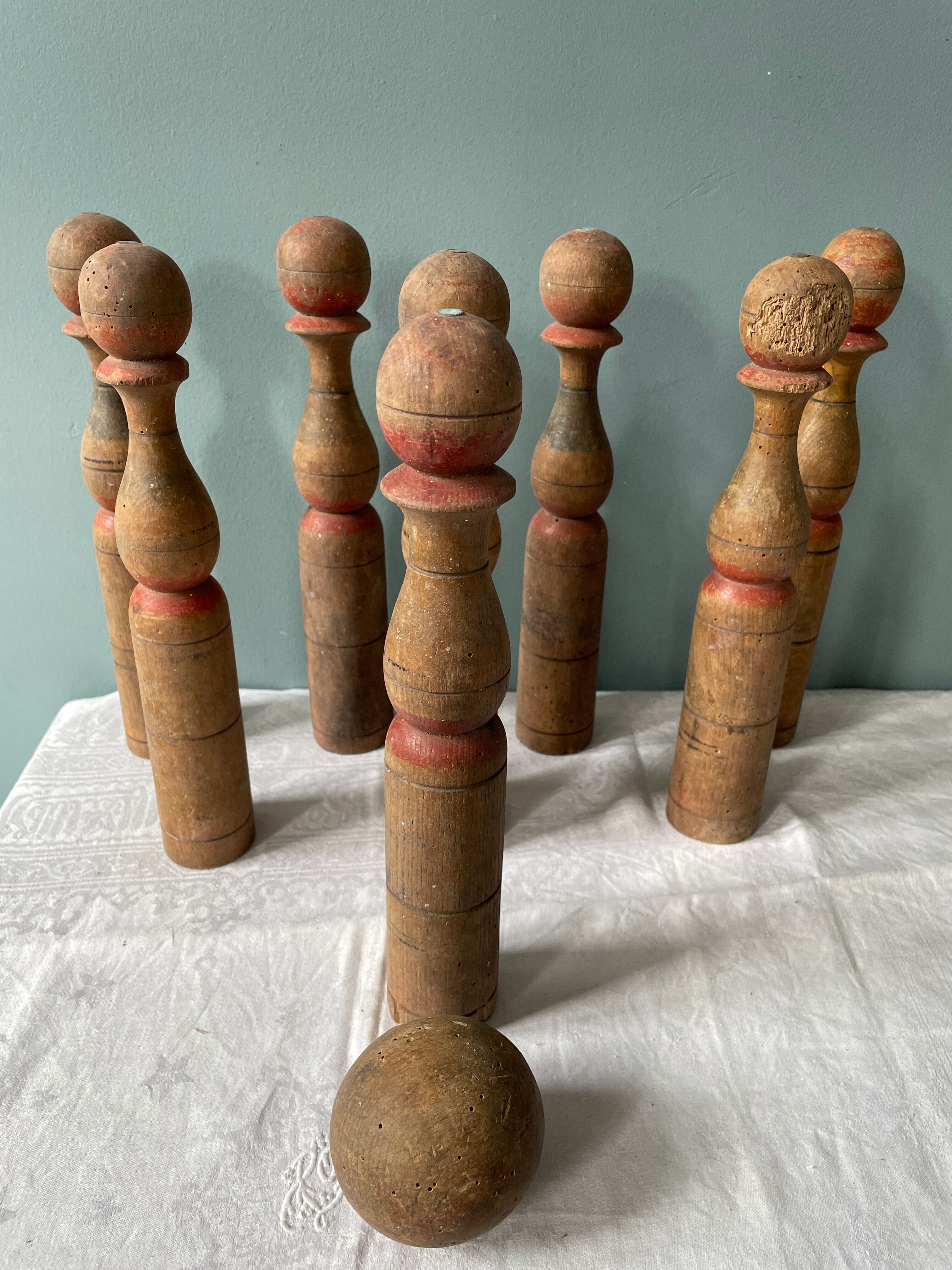 Old wooden bowling game turned late nineteenth century