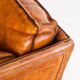 Vintage club armchair by Roche Bobois. Camel buffalo leather. France, 1980s.