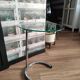 End of sofa, pedestal table, side table paget top in chrome-plated glass base
