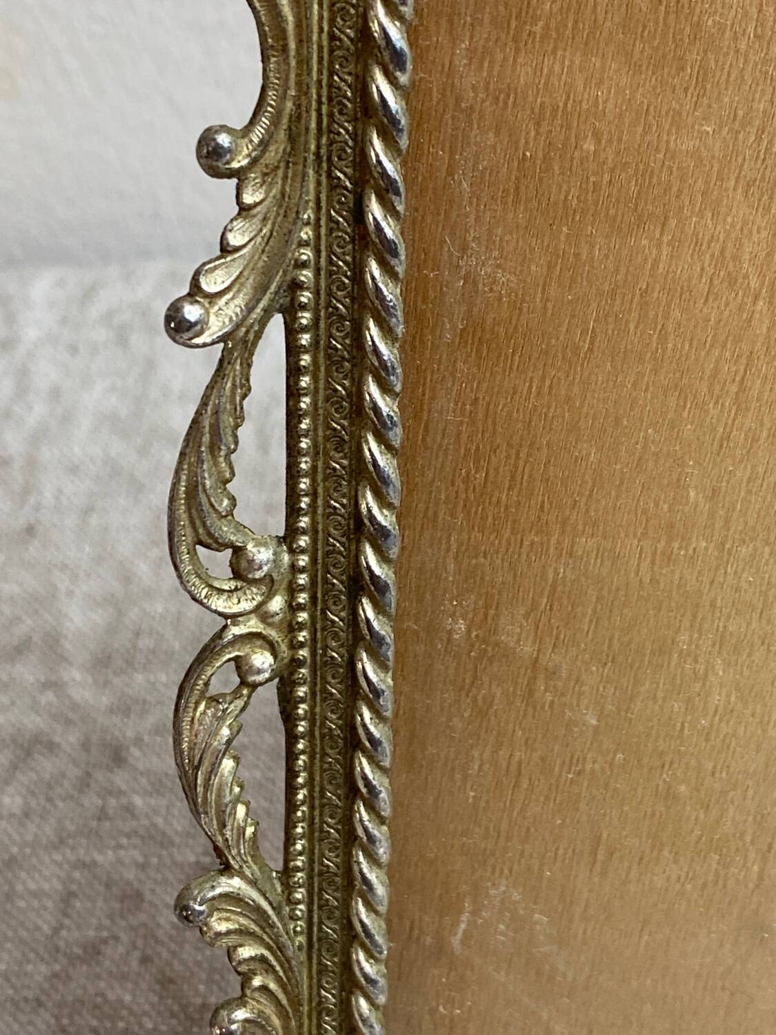 Italian gold metal frame on stand