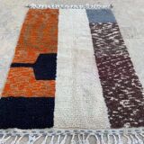 Handmade wool rug in colourful patterns, size 150x250 cm.
