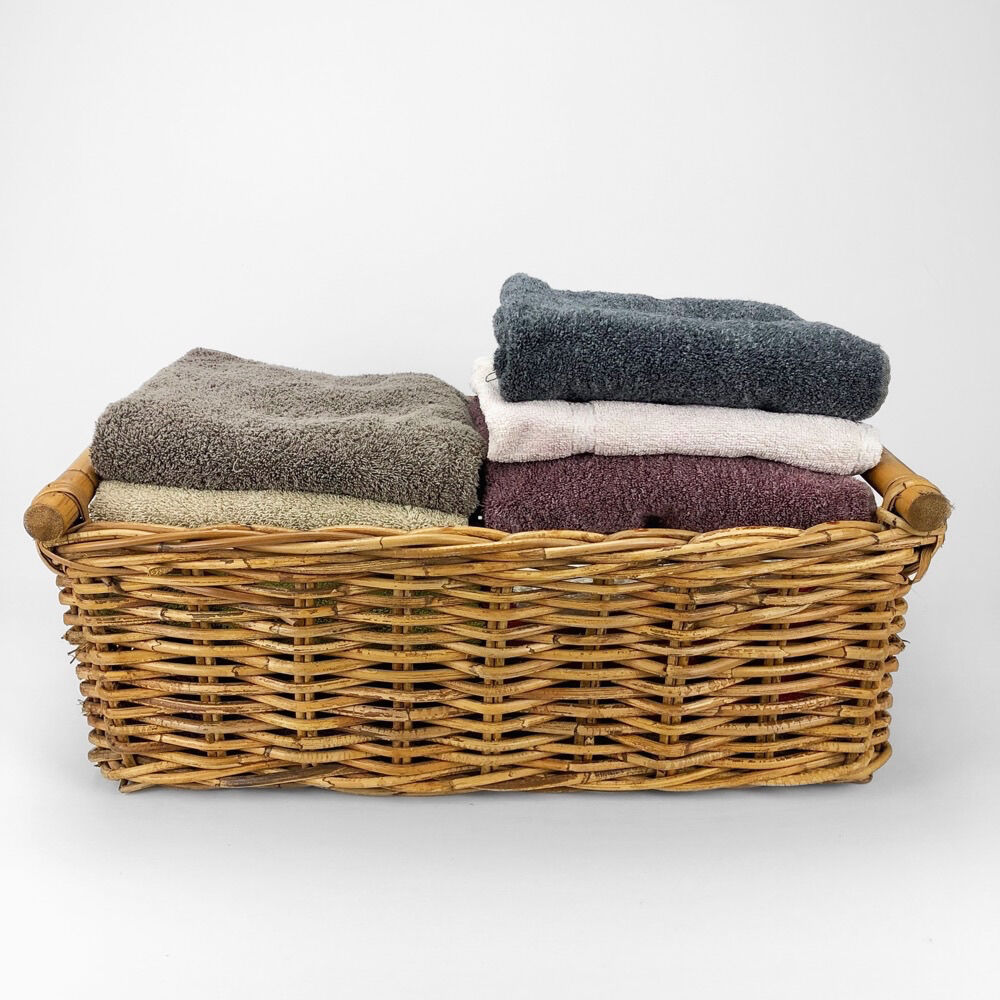 Braided rattan laundry basket