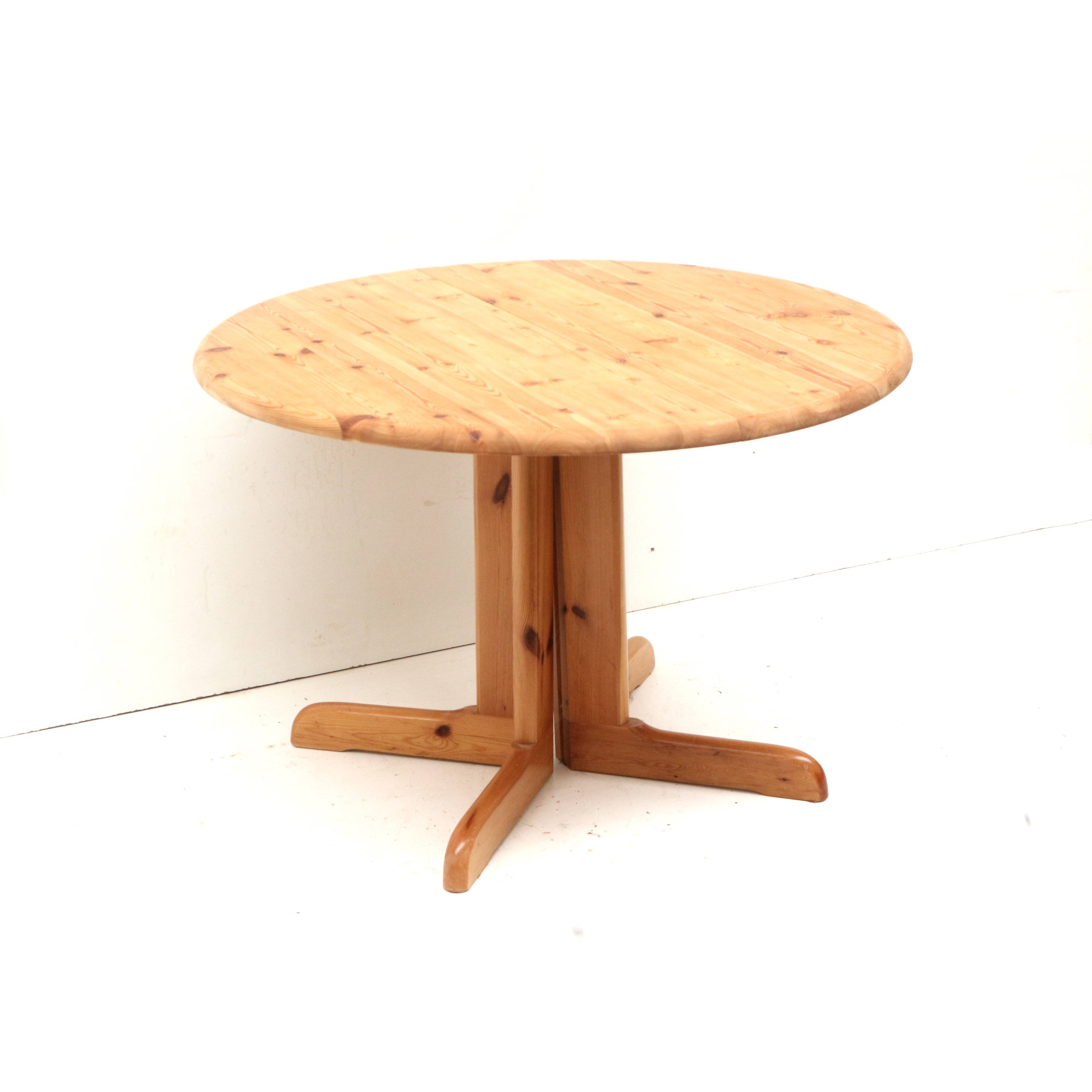 Vintage extendable pine dining table made in the 1970s