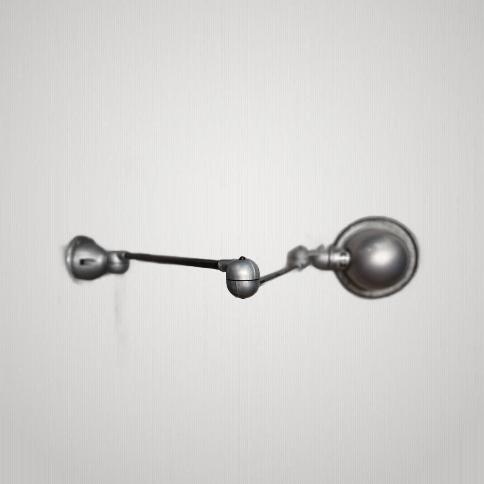 Jielde wall lamp with 2 articulated arms