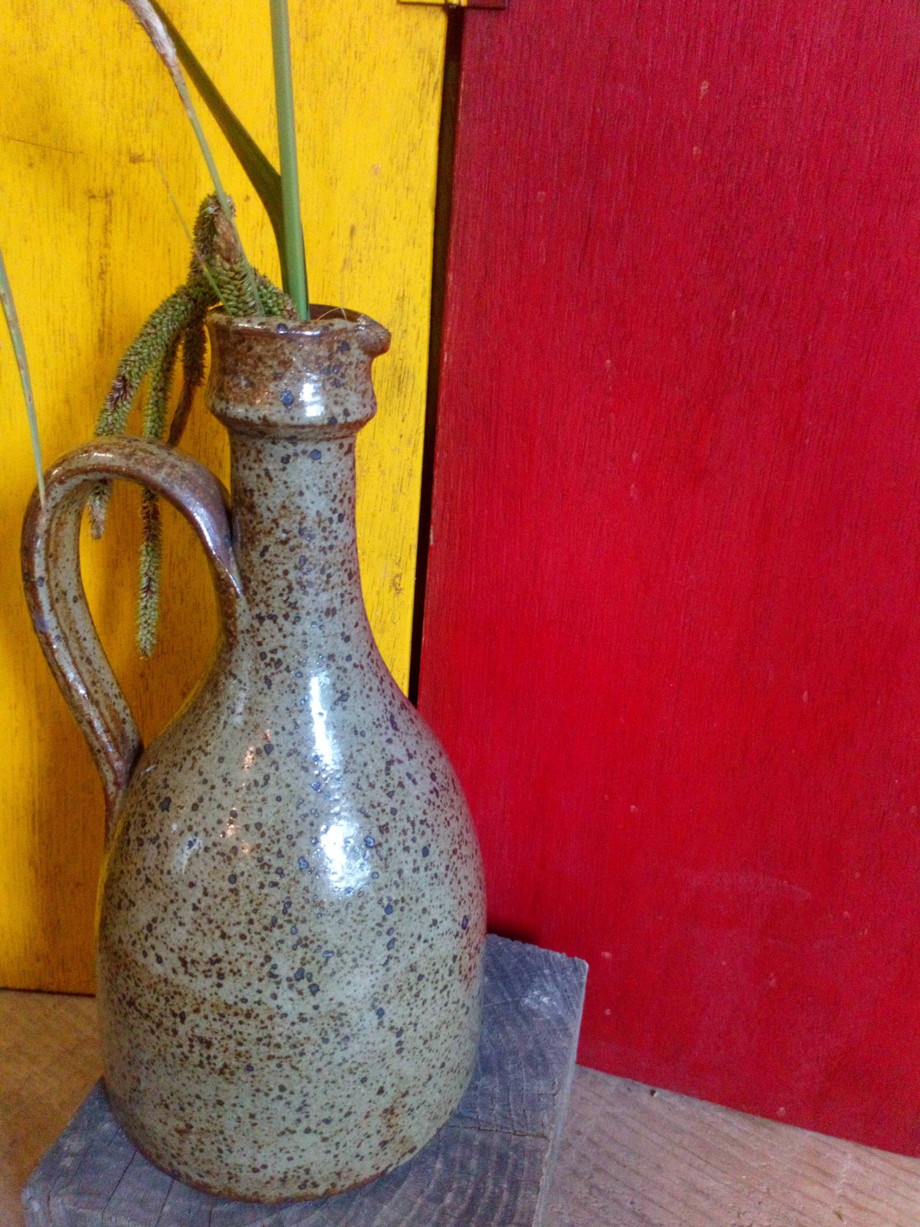 Vintage pottery in sandstone with handles and small beak