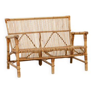 Vintage bamboo and rattan bench from the 1970s.