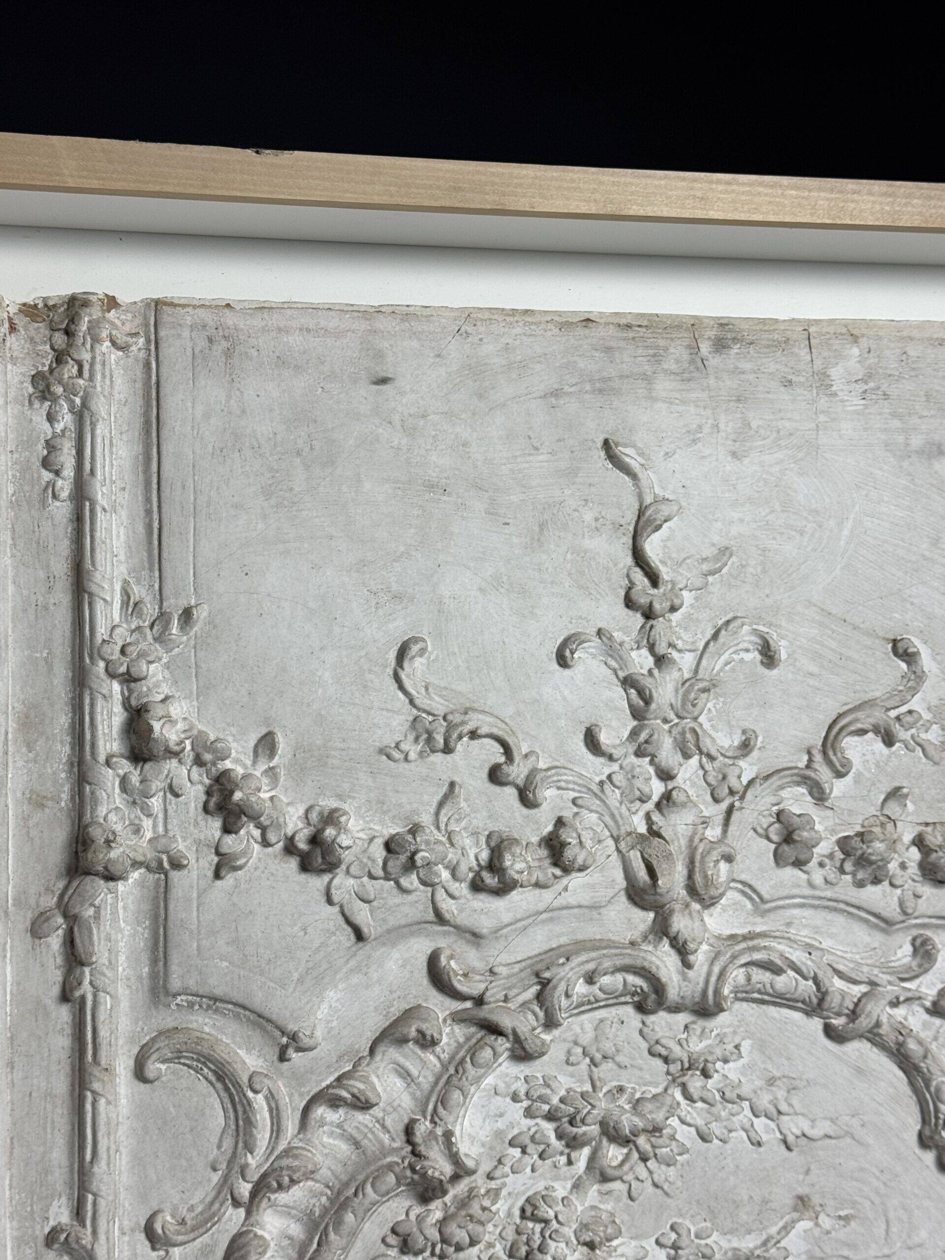 Plaster ceiling fragment framed