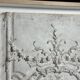 Plaster ceiling fragment framed