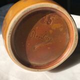 Enamelled stoneware pourer signed Denbac