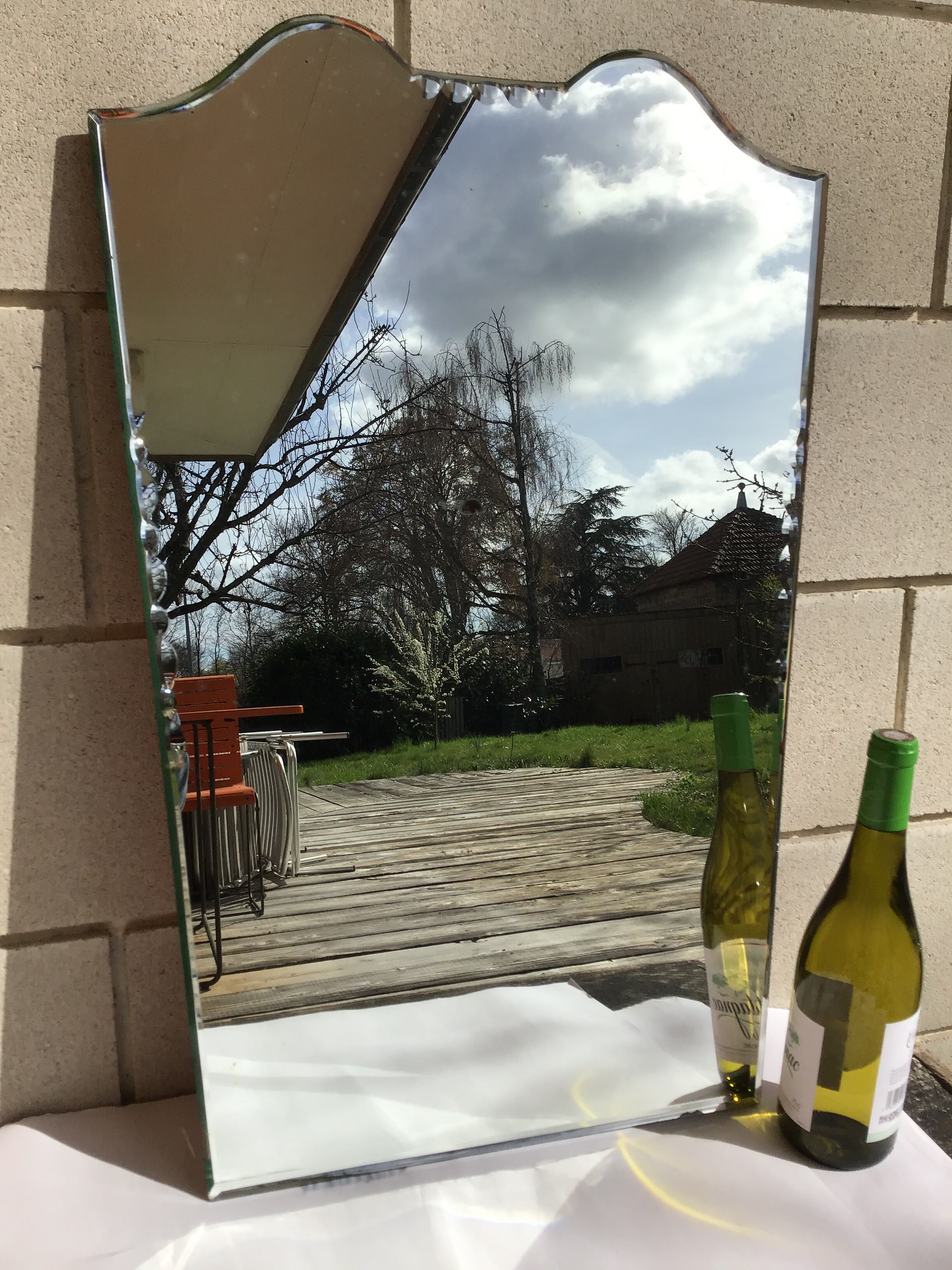 Bevelled mirror trapeze two waves at the top