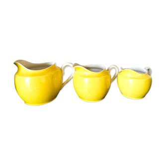 3 yellow milk jugs