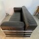 Old vintage leather and tubular metal sofa, design 70s