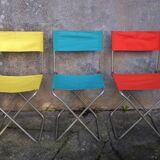 Set of three folding fabric chairs