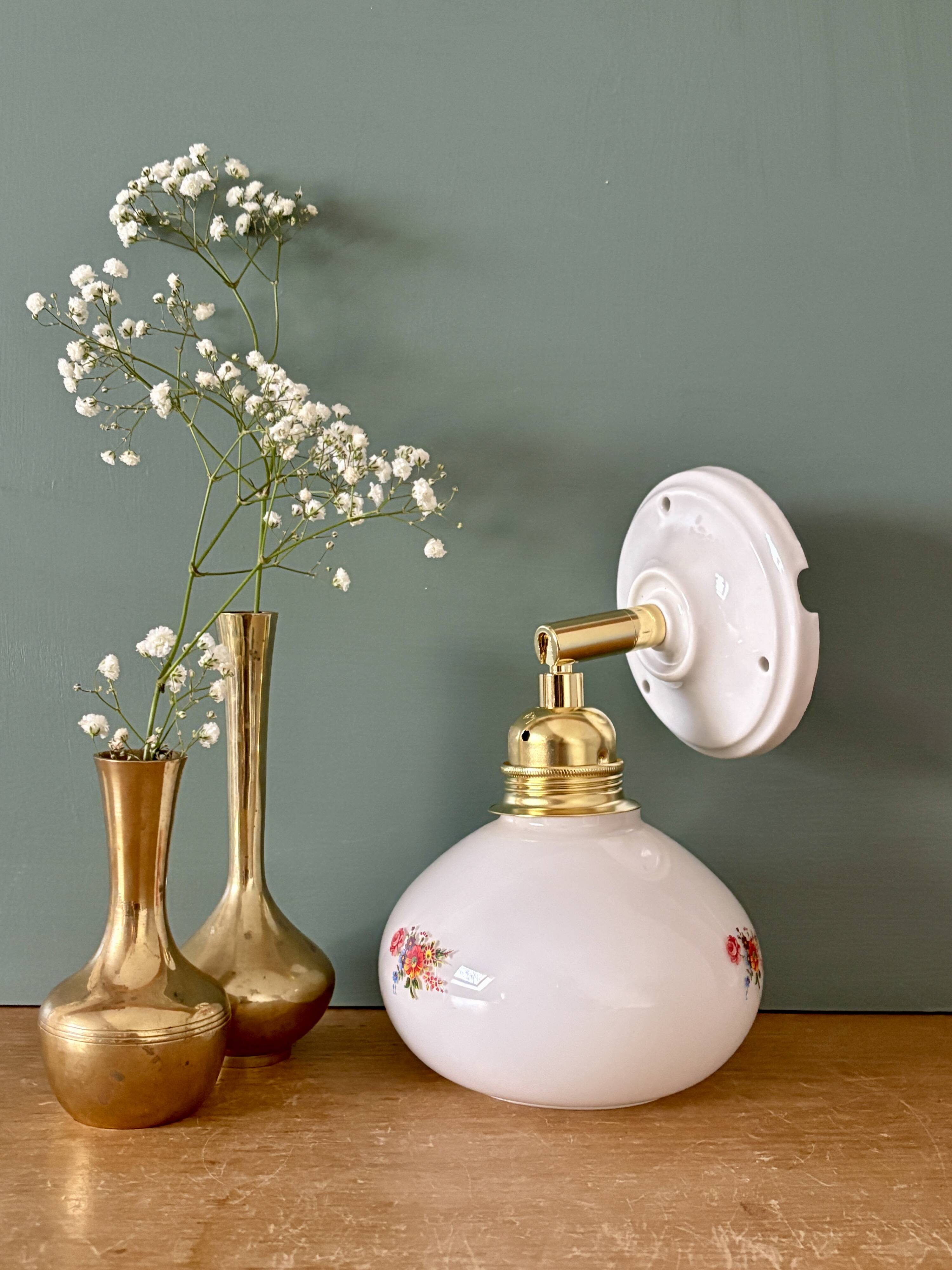 Vintage globe wall sconce in white opaline glass with floral decorations