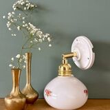 Vintage globe wall sconce in white opaline glass with floral decorations