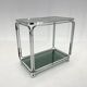 Mid-century Italian chrome & smoked glass serving carts