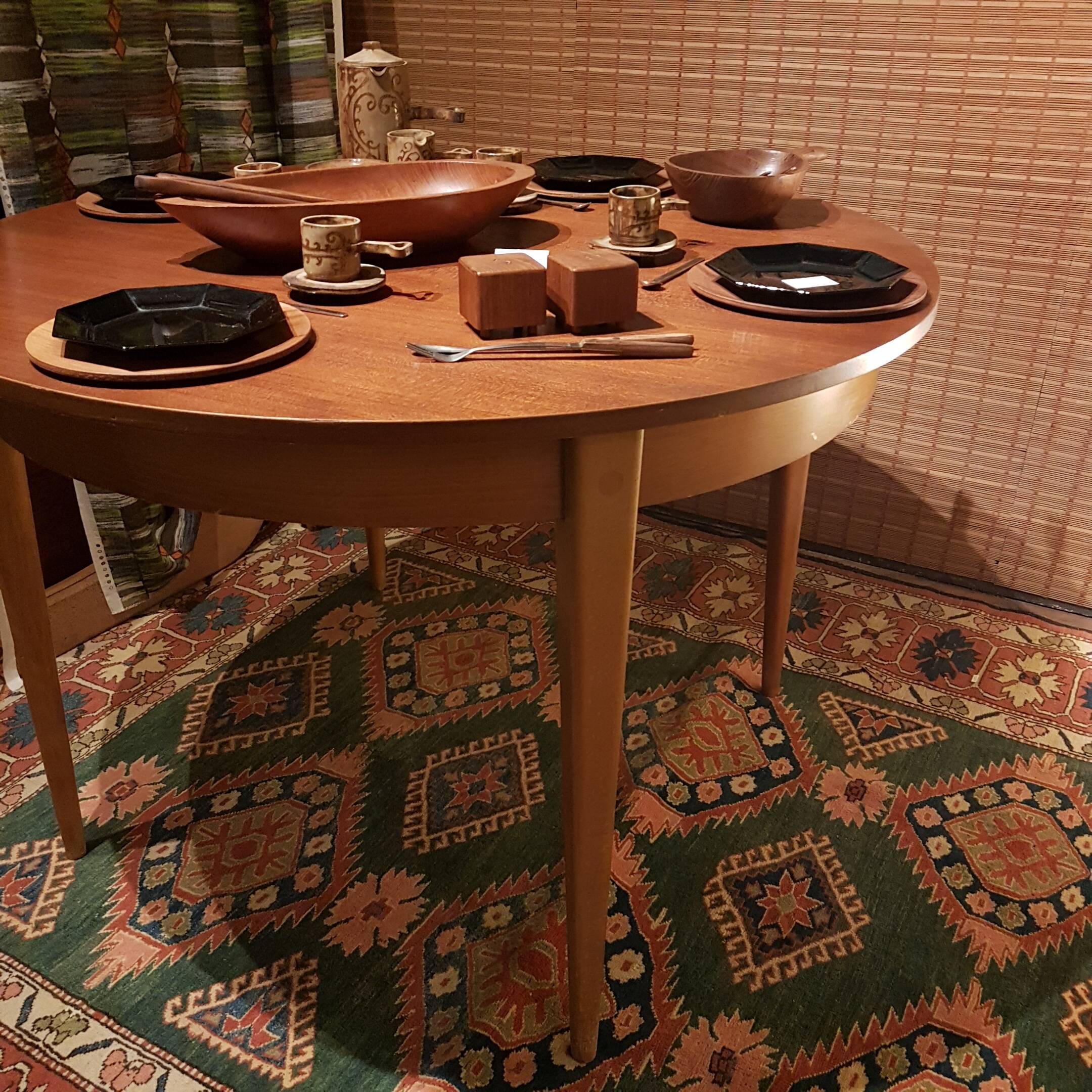 Scandinavian round extending table.