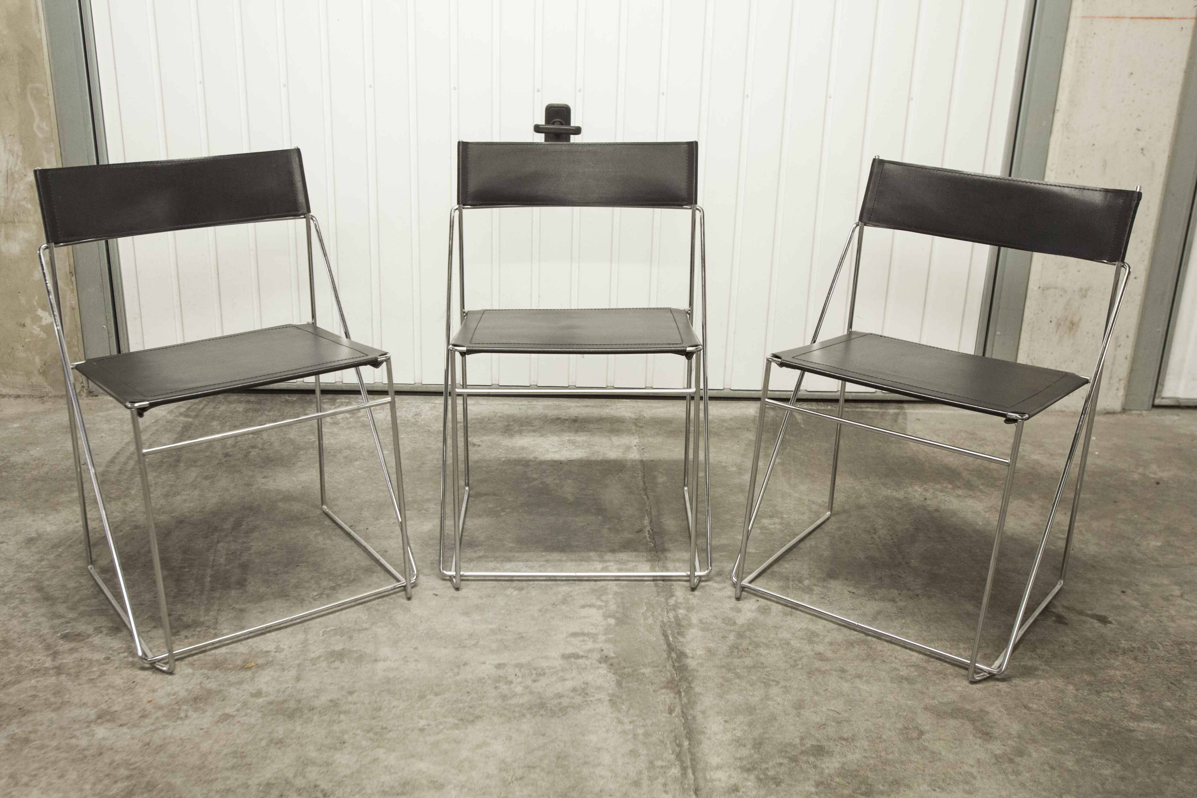 Set of 3 minimalist X line chairs by Niels Jorgen Haugesen.