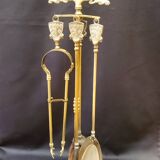 Brass fireplace set with 4 accessories.