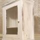 Glazed wall-mounted medicine cabinet in patinated wood