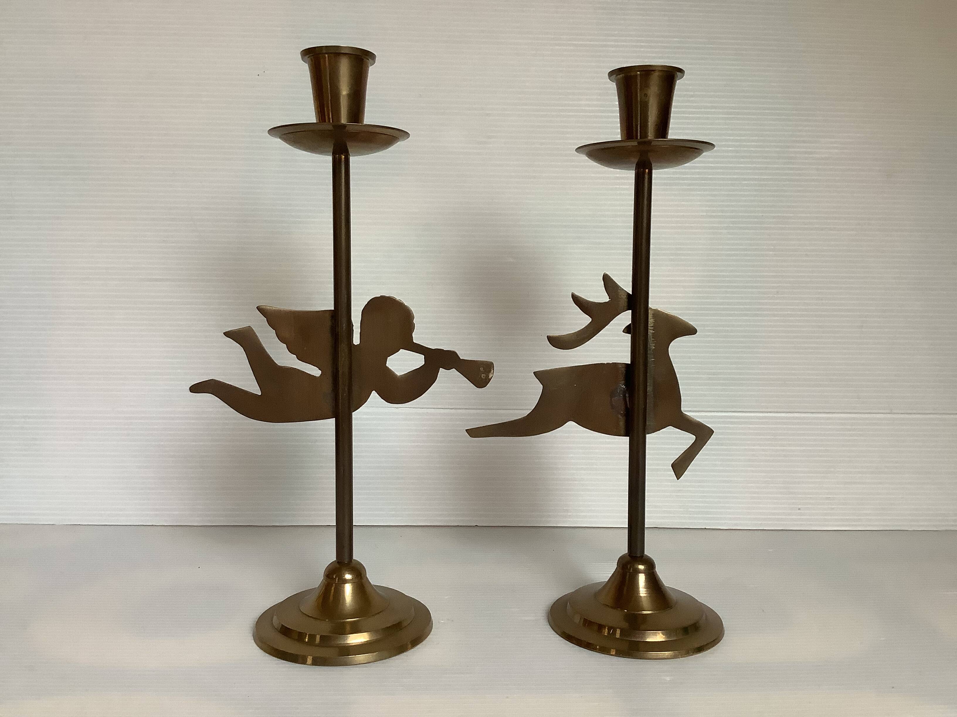 Pair of brass Christmas angel and reindeer candle holders