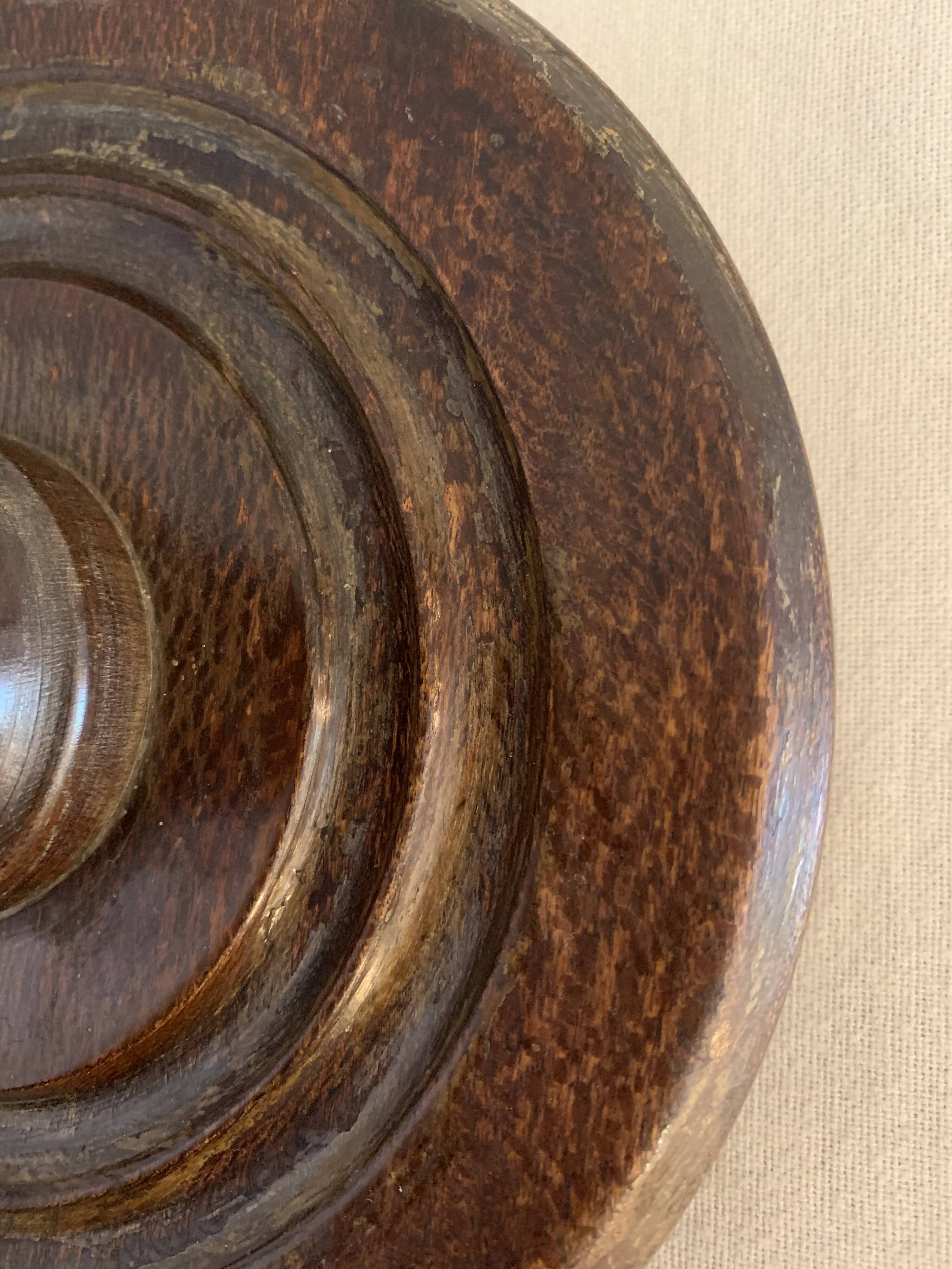 Turned wooden lamp foot in the shape of a warhead