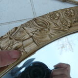 Miroir biseauté art déco en bois et stuc doré 66x39cm