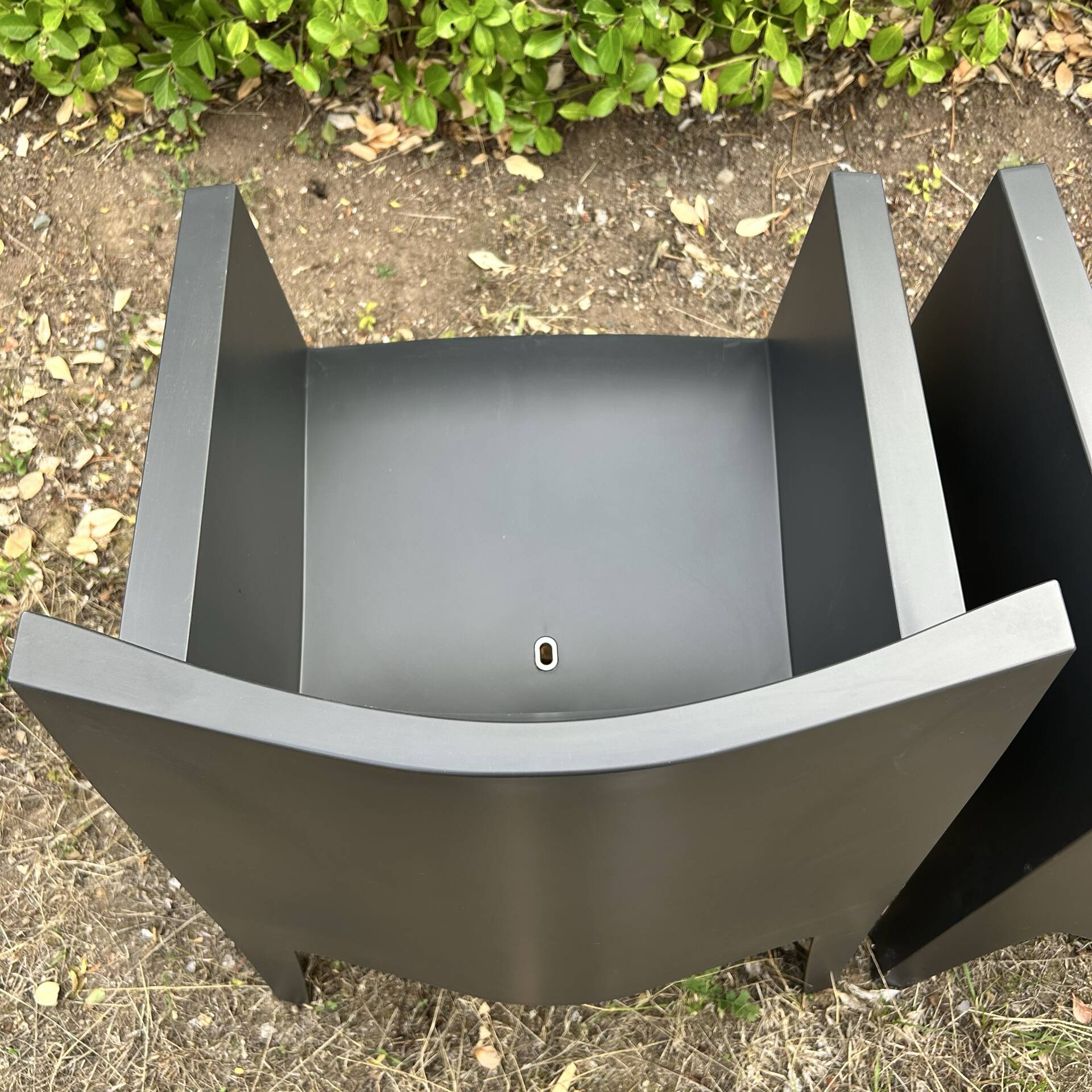 2 black Toy chairs designed by Starck